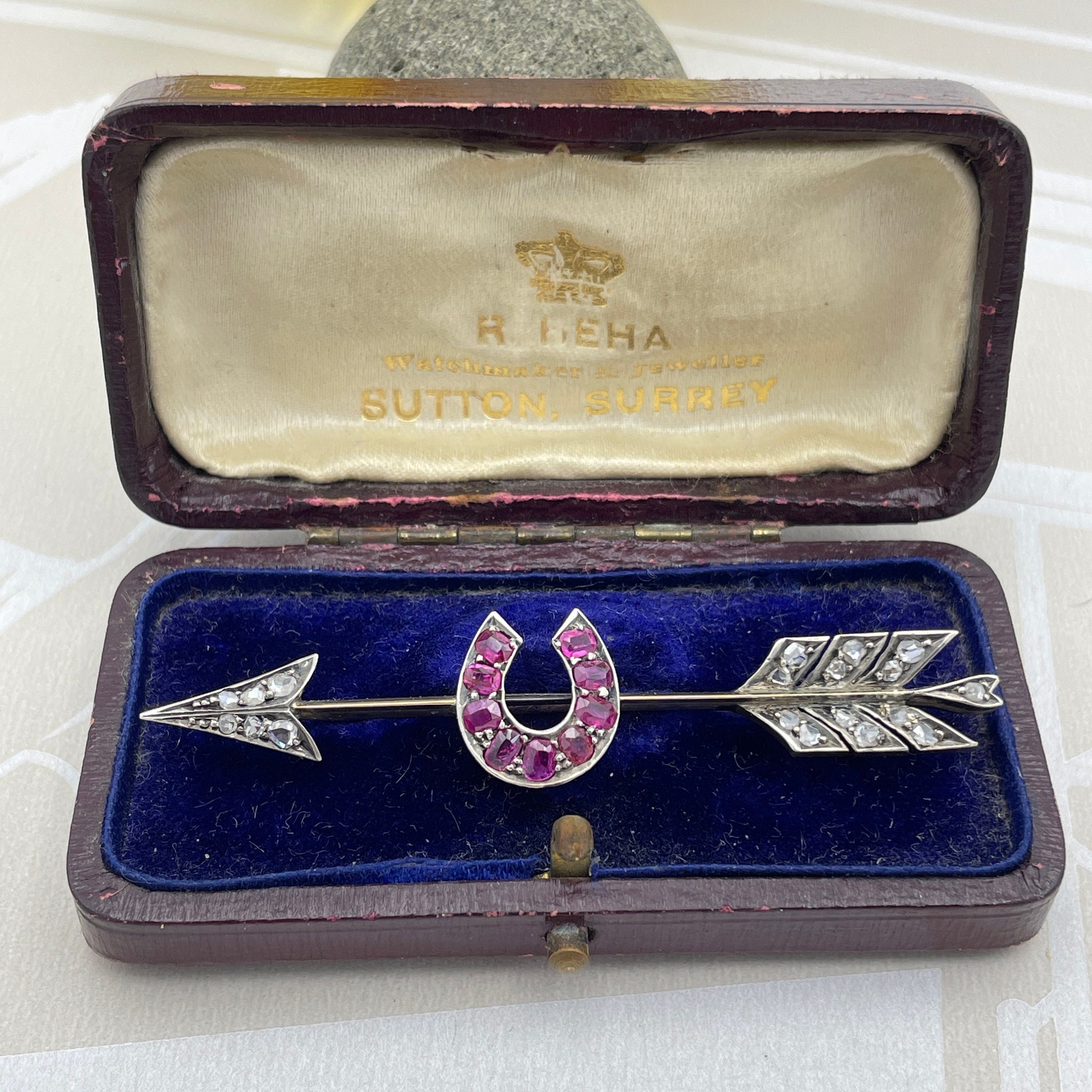 Victorian Gold & Silver, Rose Cut Diamond And Ruby Arrow Horseshoe Brooch in original case