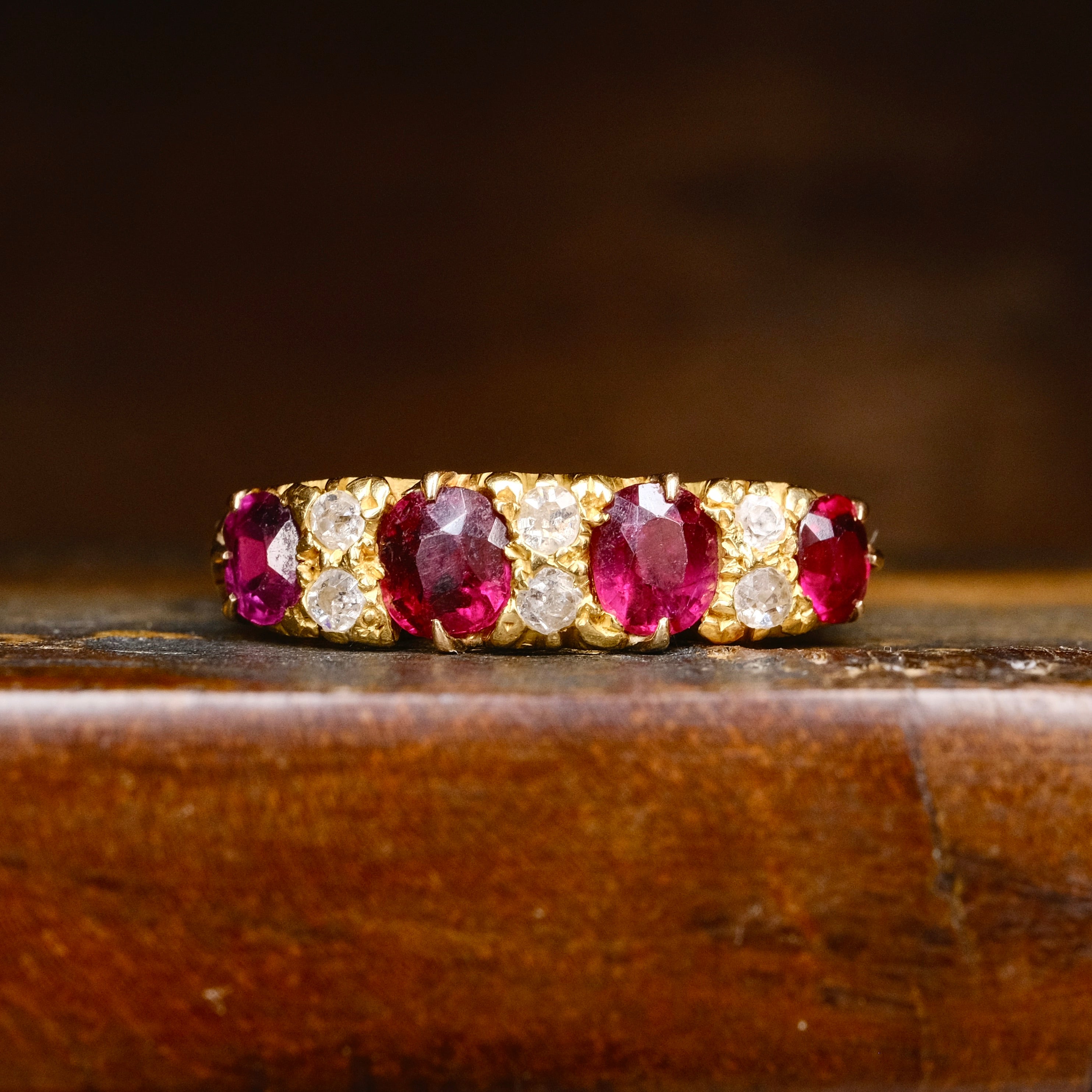 Antique 18ct gold ring with oval natural rubies and old cut diamonds in a five-stone band