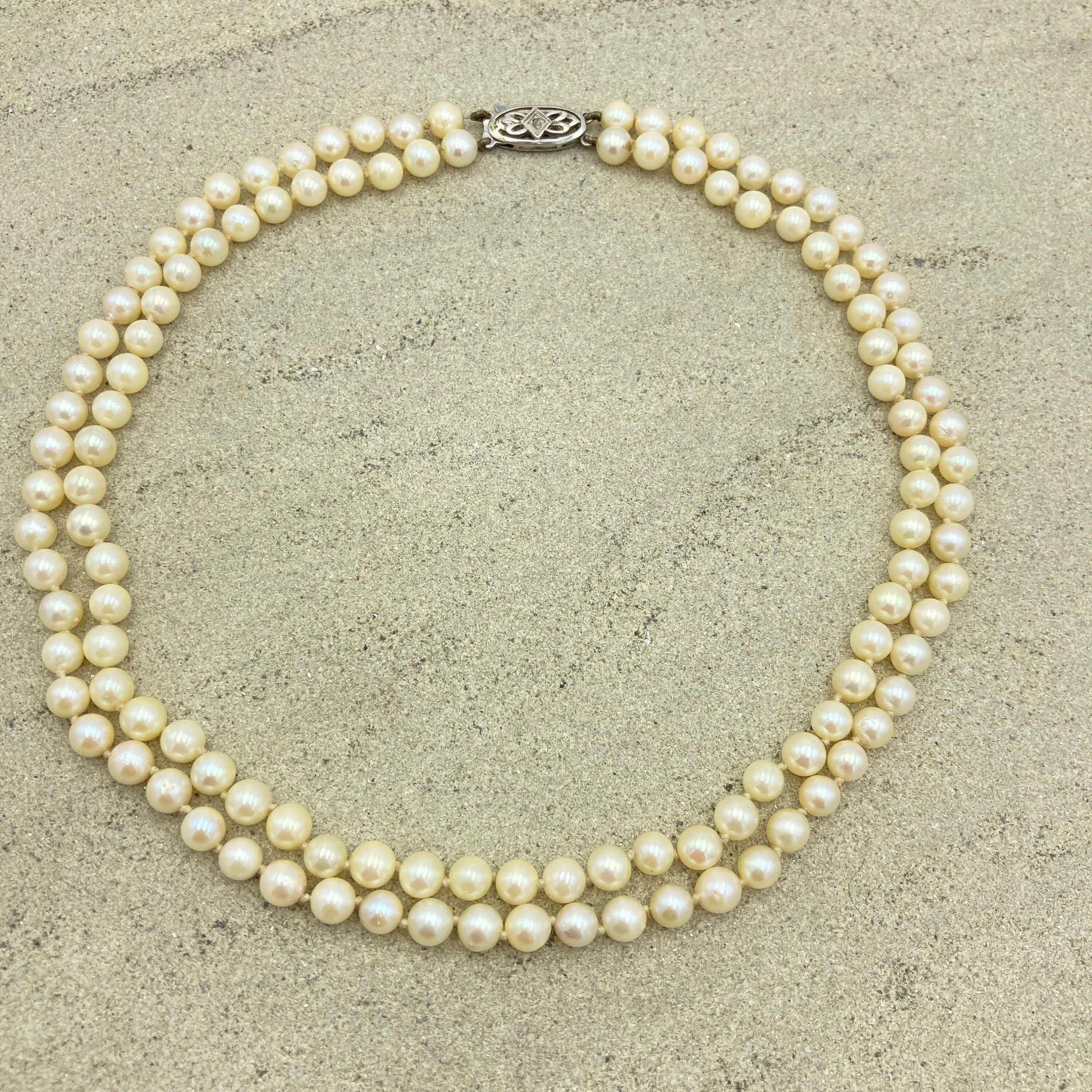 Vintage Double string hand knotted cultured pearls , 9ct white gold & diamond chip clasp, c1920s/30s