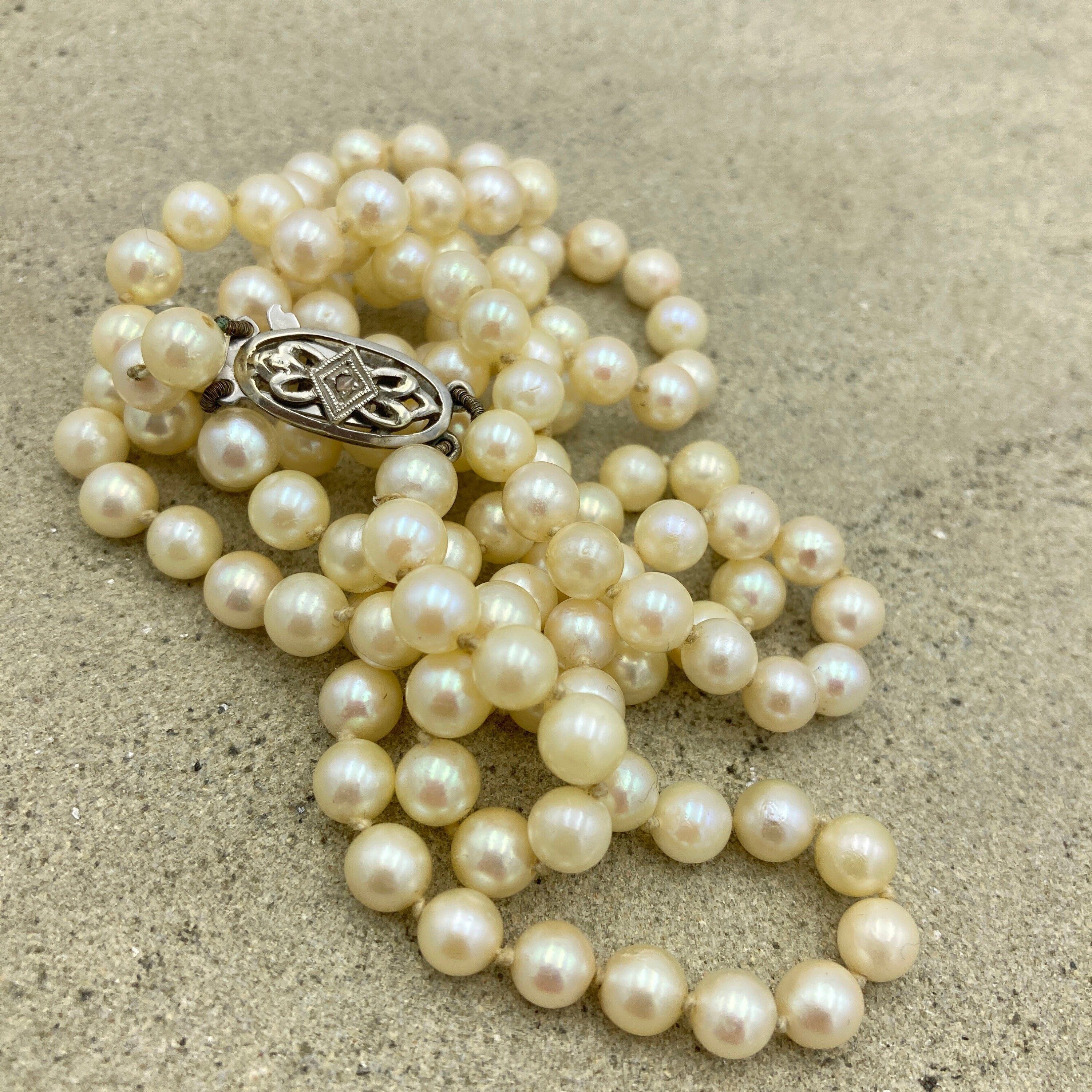 Vintage Double string hand knotted cultured pearls , 9ct white gold & diamond chip clasp, c1920s/30s