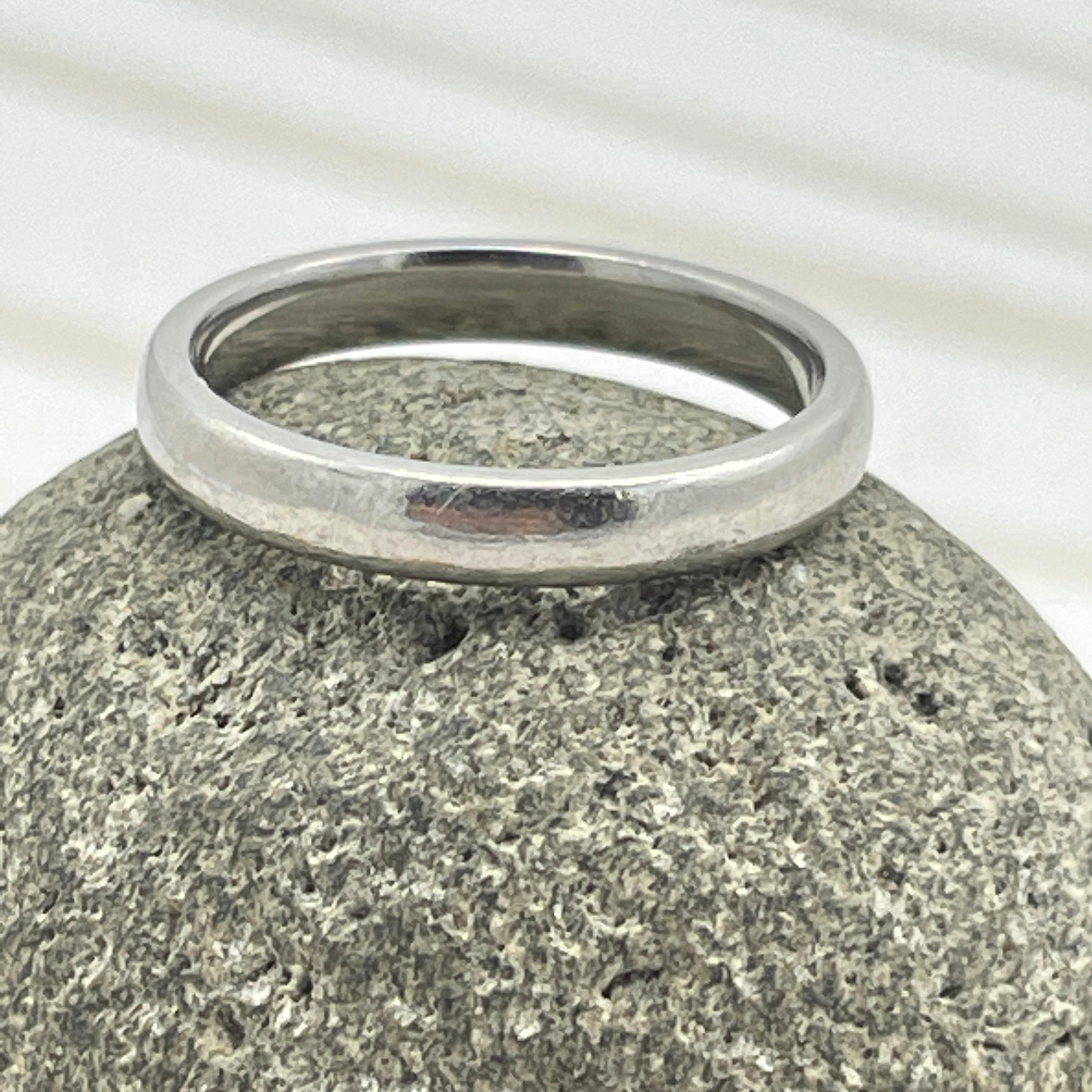 Contemporary Platinum court shaped band ring