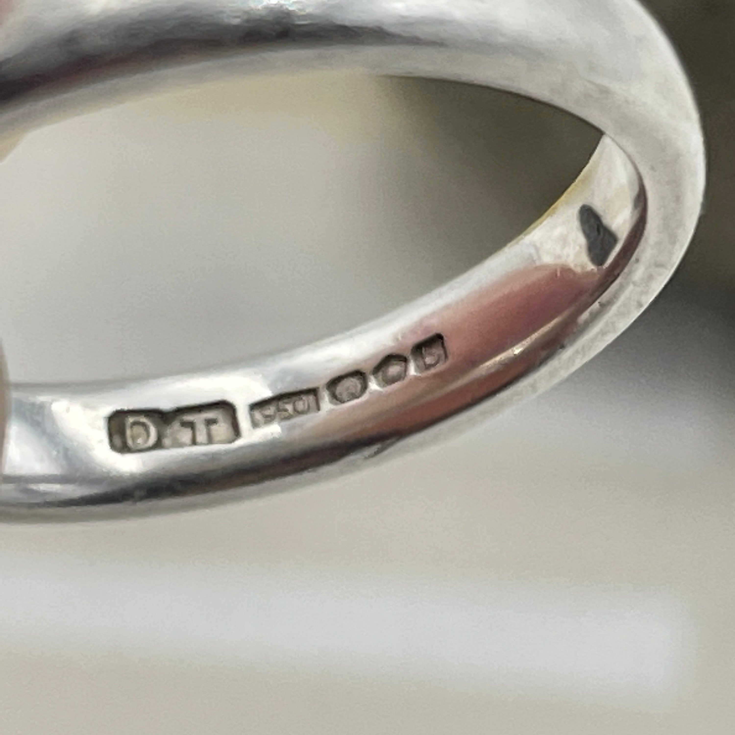 Contemporary Platinum court shaped band ring