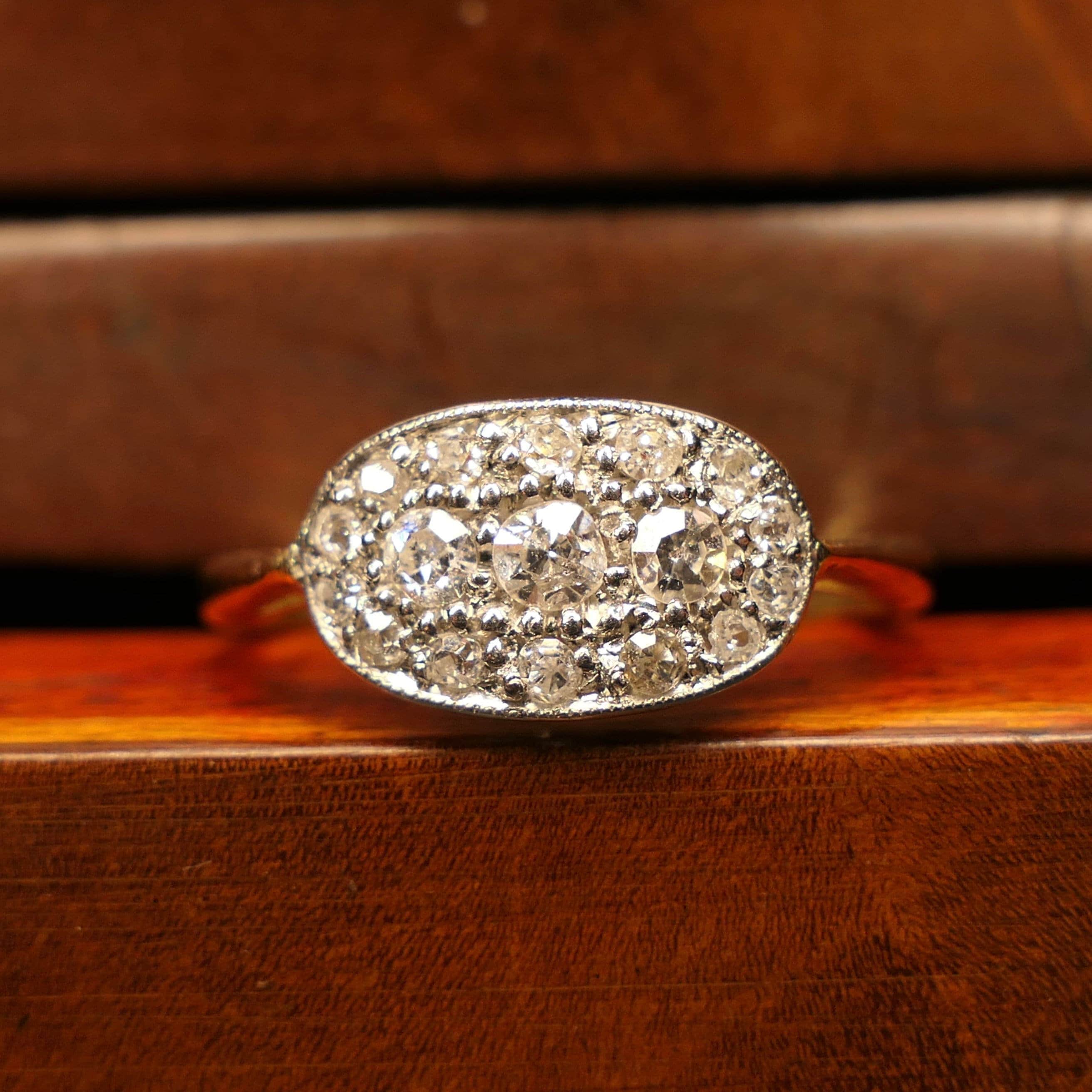 Early 20th century, 18ct gold & platinum, old cut diamond cluster ring, c1910