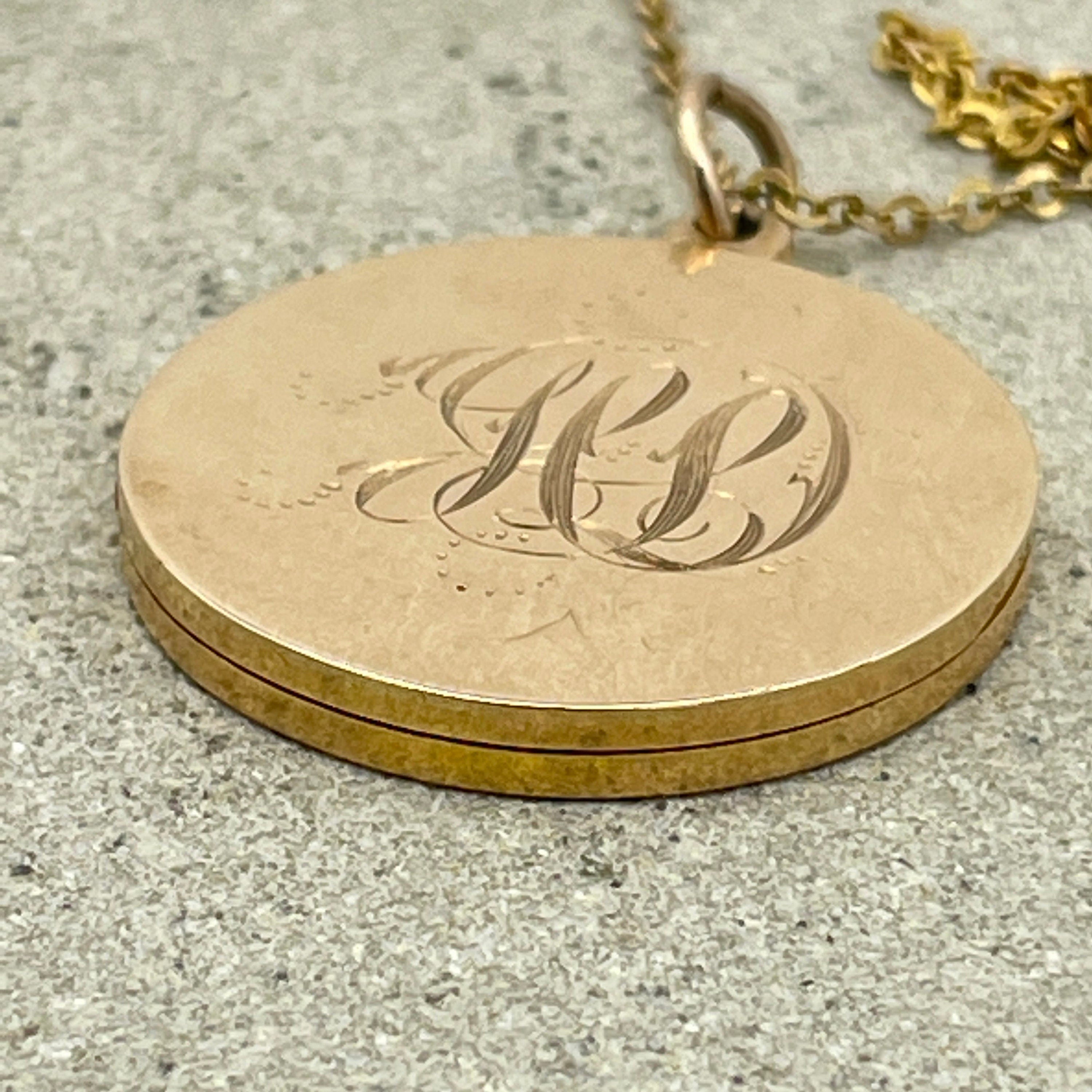 Edwardian hallmarked 15ct gold round locket, chester hallmark 1911, 8 grams, on 9ct gold chain with barrel clasp