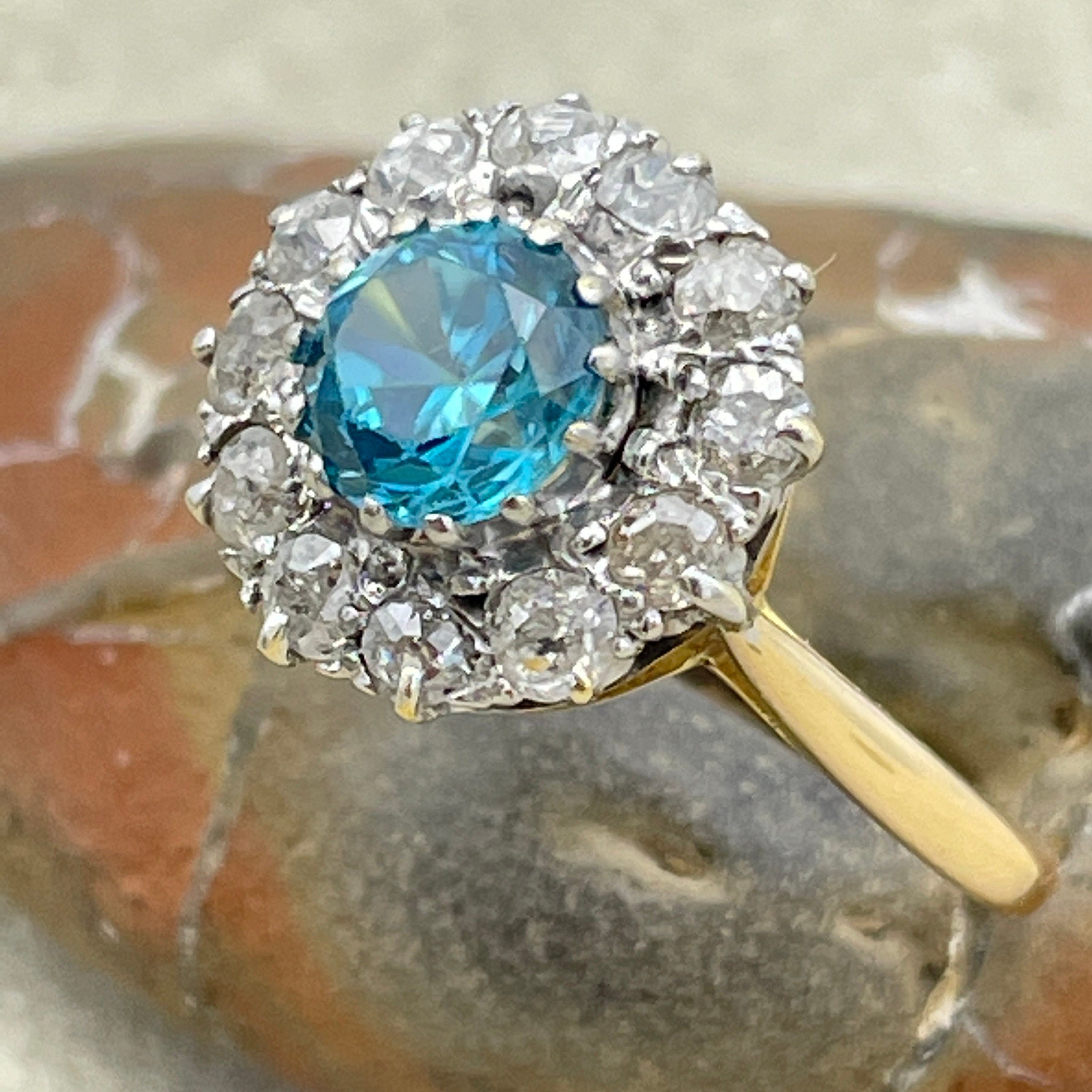 Antique 18ct gold & platinum blue zircon and old cut diamond cluster ring c1910