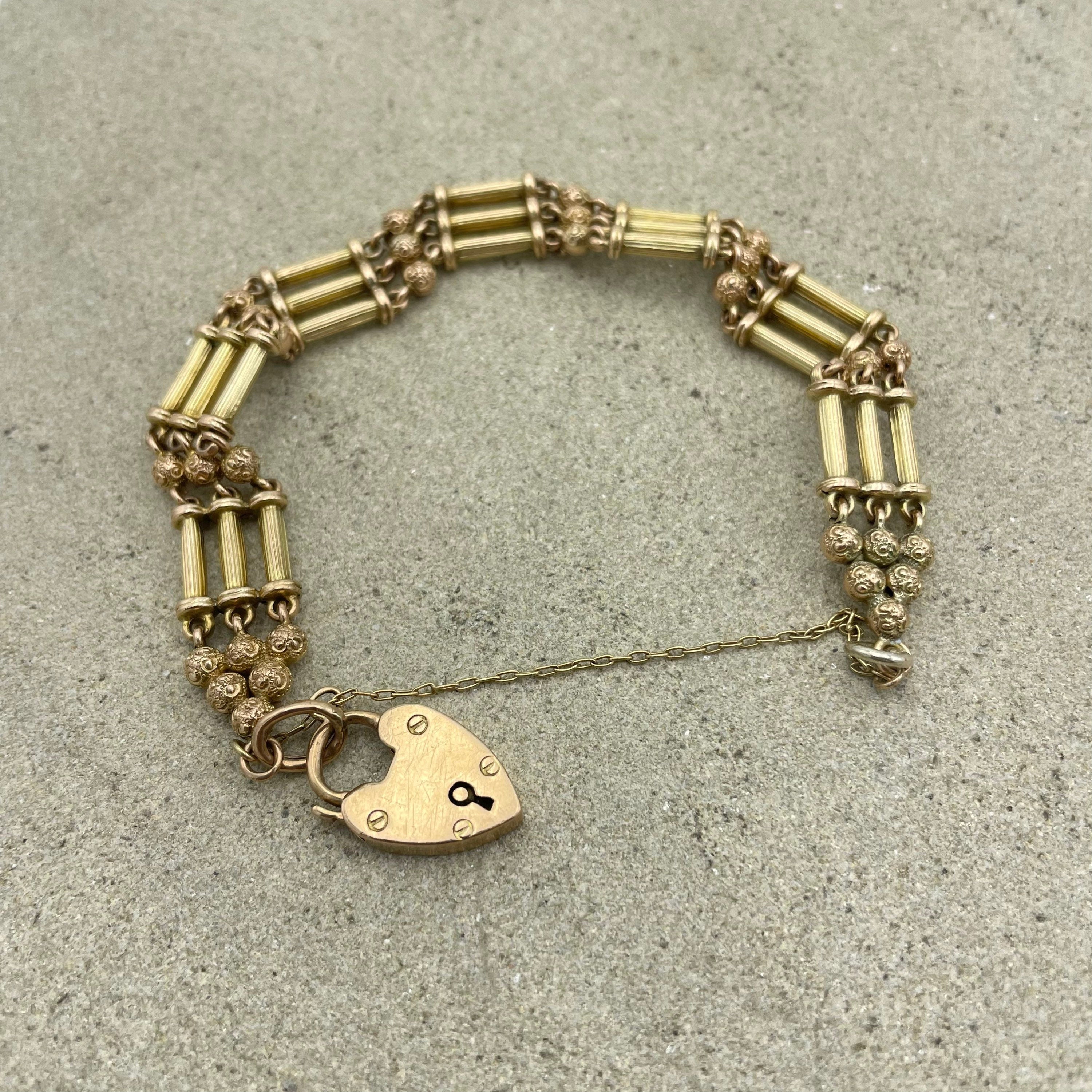 Edwardian 9ct gold fancy column gate link bracelet with heart padlock