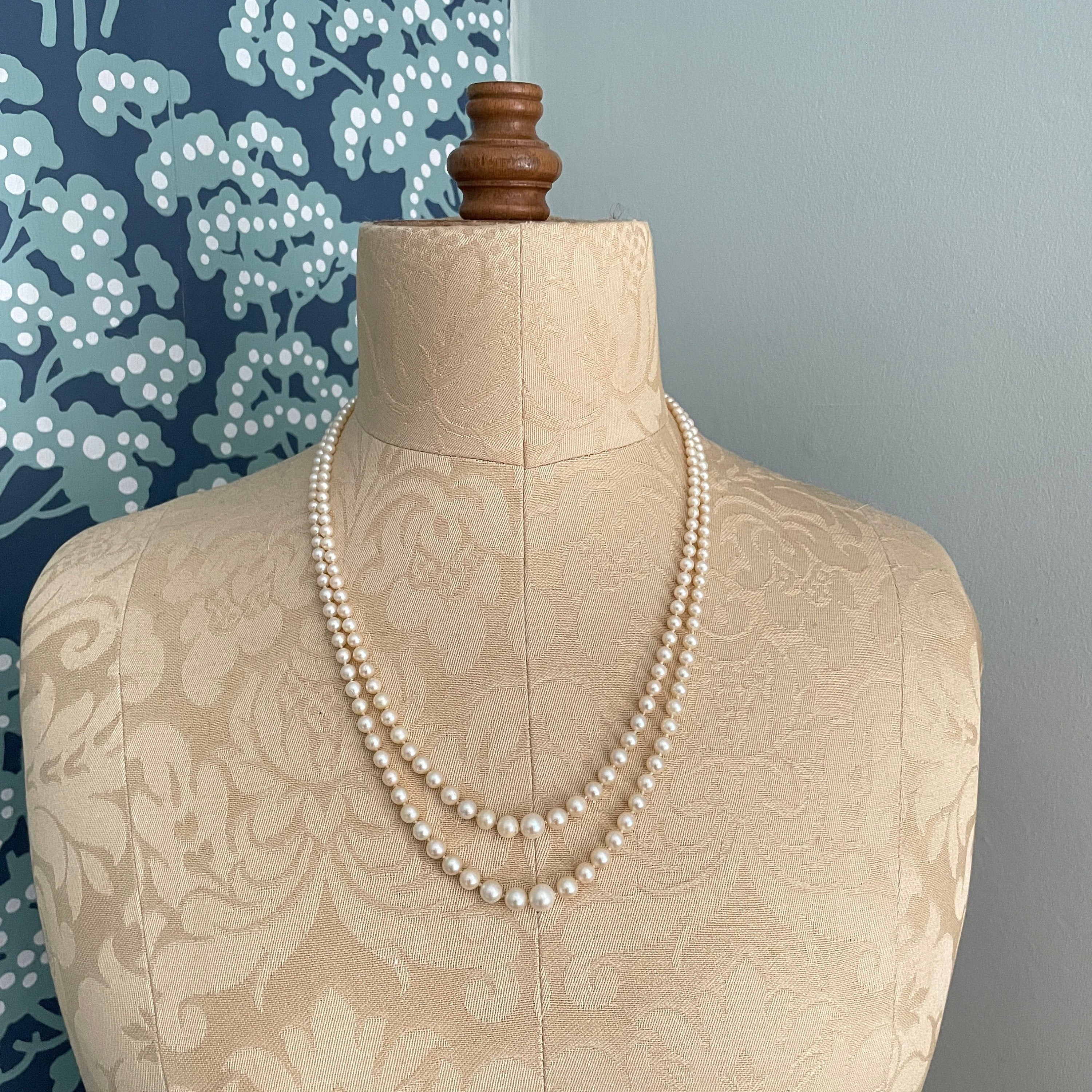 Art deco,  long cultured pearls necklace, double strand with 9ct gold clasp, diamond chip