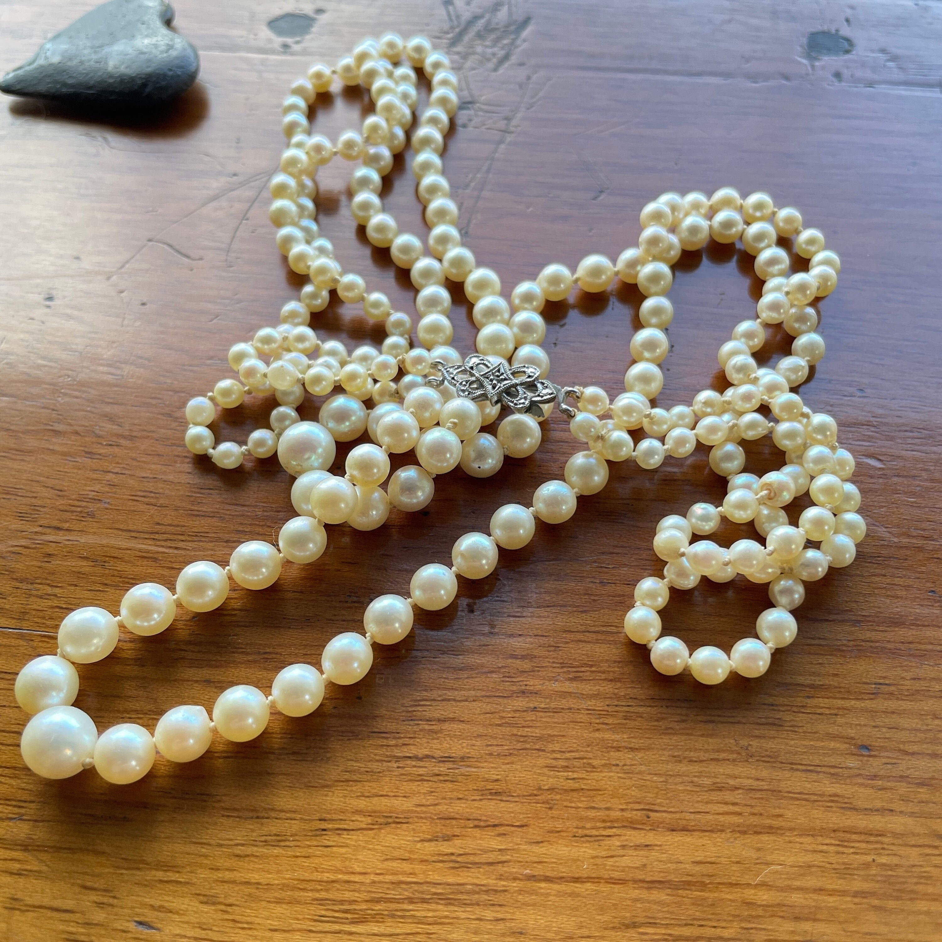 Art deco,  long cultured pearls necklace, double strand with 9ct gold clasp, diamond chip