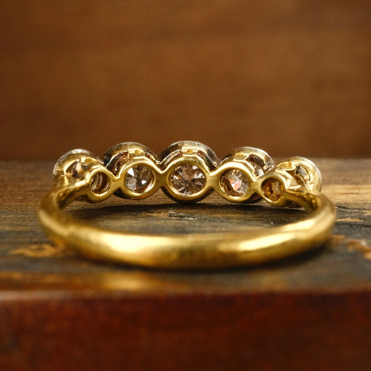 1920s, Art Deco, 1.3 Carats, Bezel Set 5 stone Old European Cut Diamond 18ct Gold & Platinum Ring