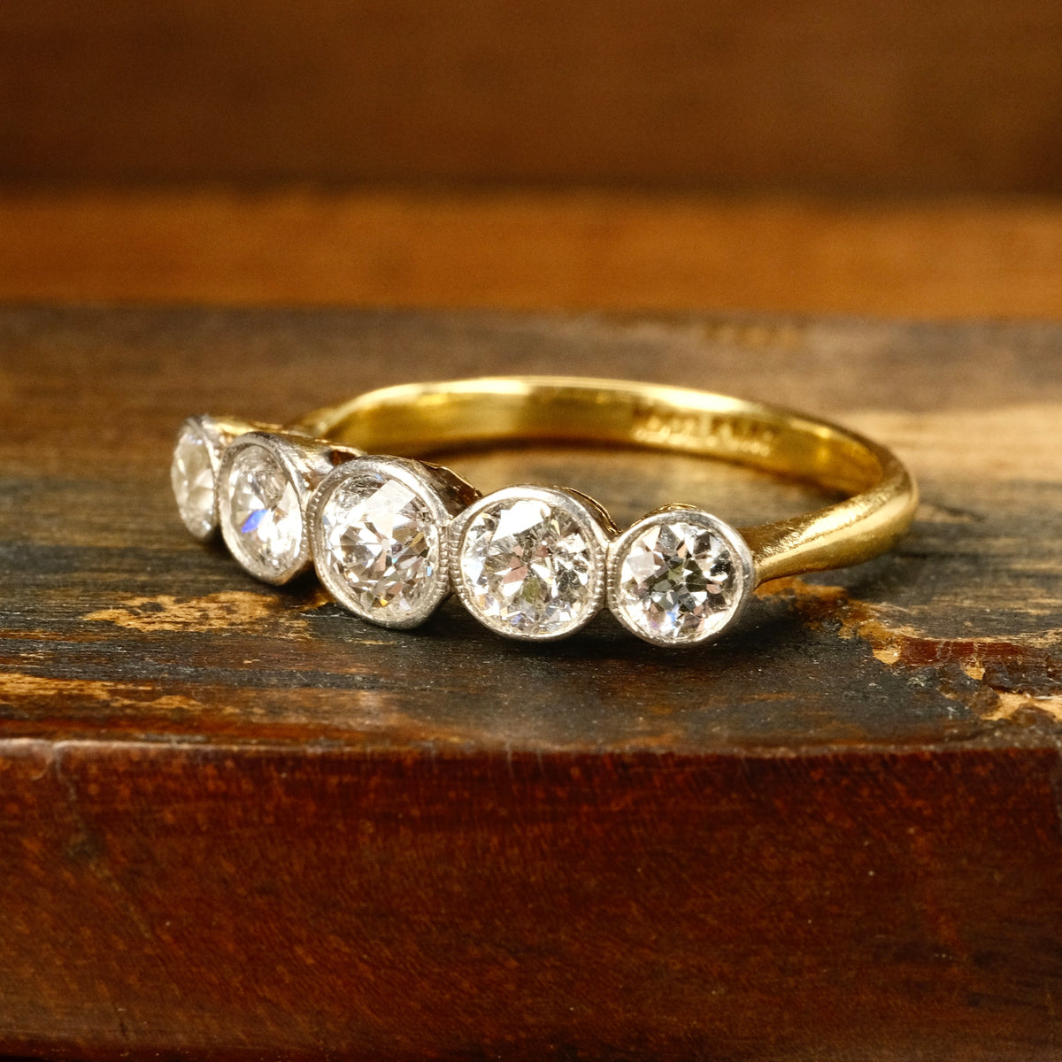 1920s, Art Deco, 1.3 Carats, Bezel Set 5 stone Old European Cut Diamond 18ct Gold & Platinum Ring