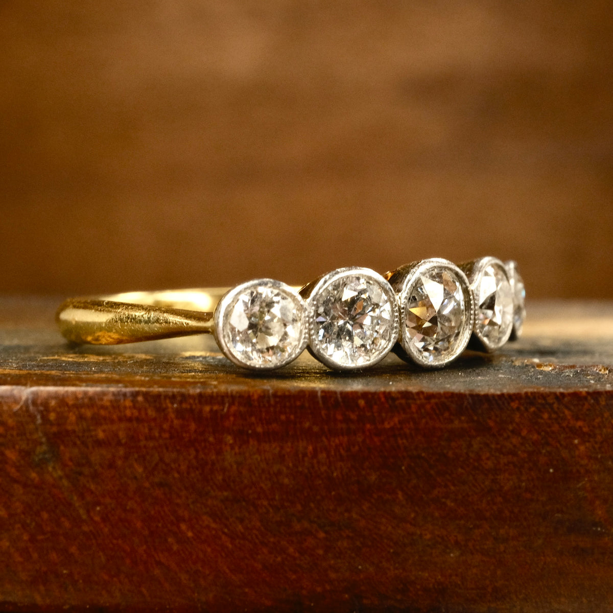 1920s, Art Deco, 1.3 Carats, Bezel Set 5 stone Old European Cut Diamond 18ct Gold & Platinum Ring