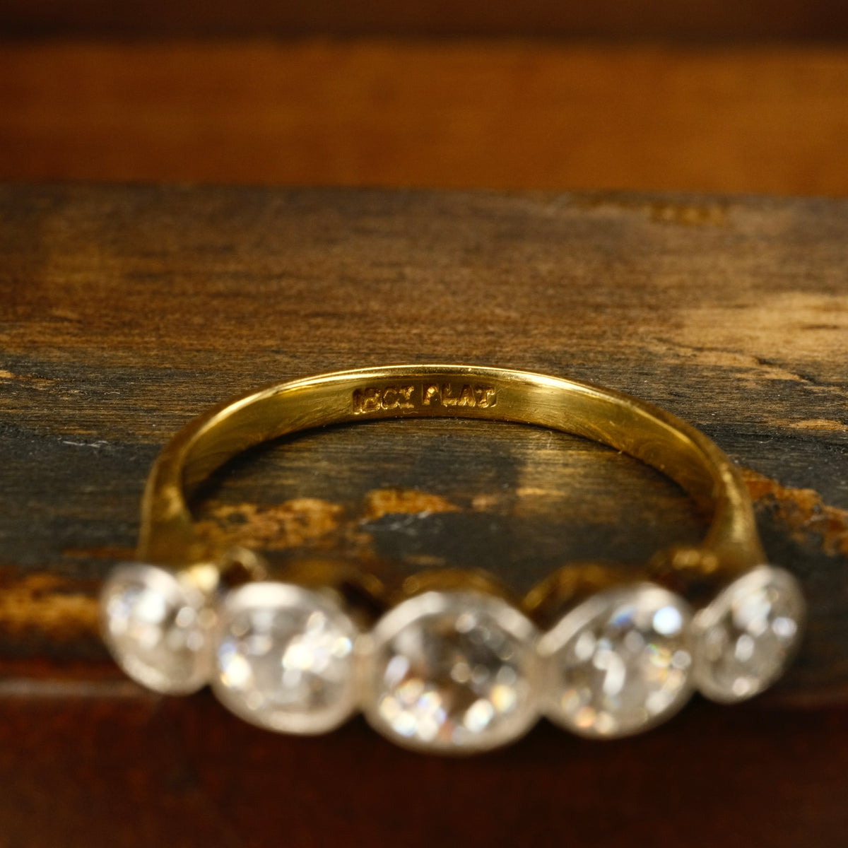 1920s, Art Deco, 1.3 Carats, Bezel Set 5 stone Old European Cut Diamond 18ct Gold & Platinum Ring