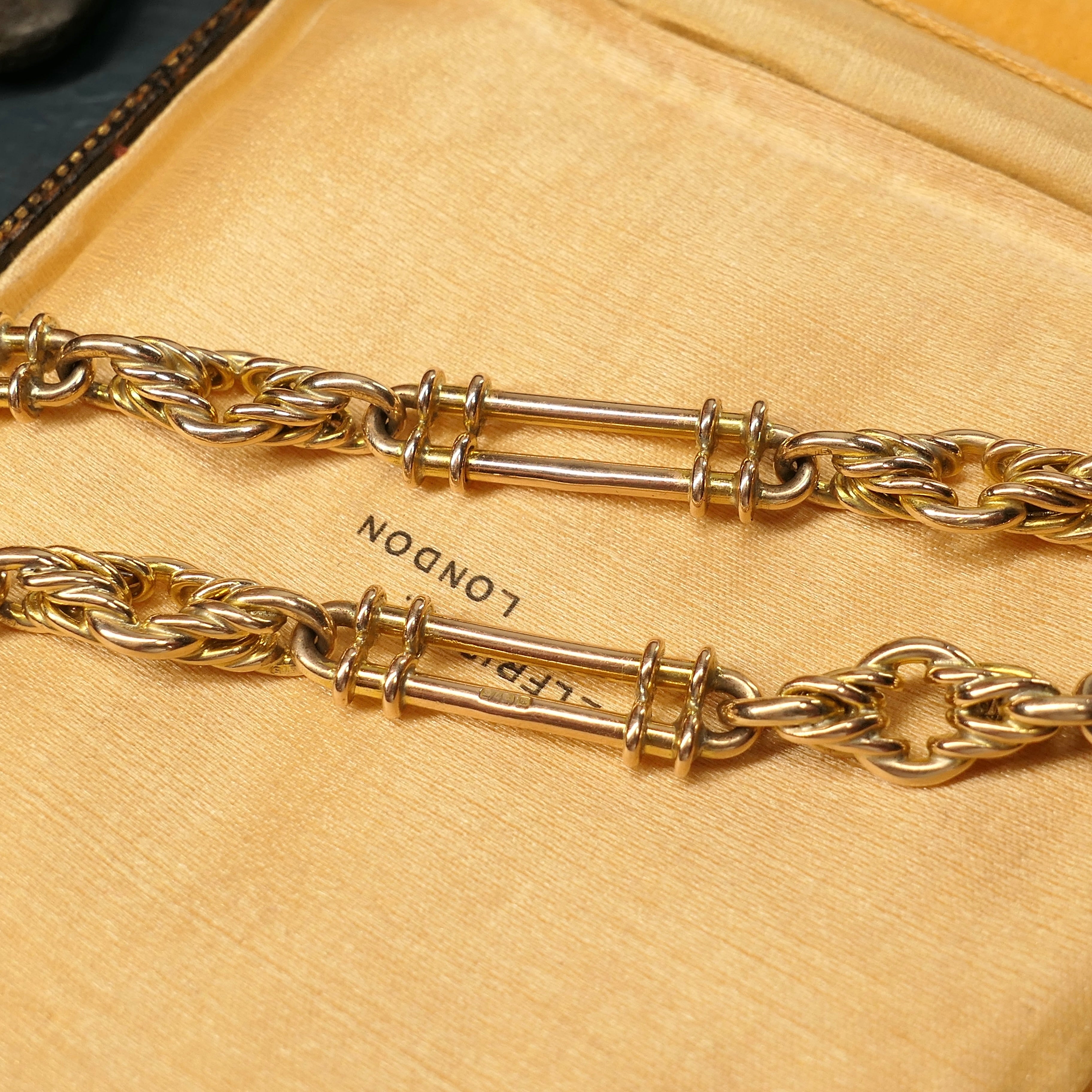 Lovers knot and trombone link, chunky, antique gold necklace 