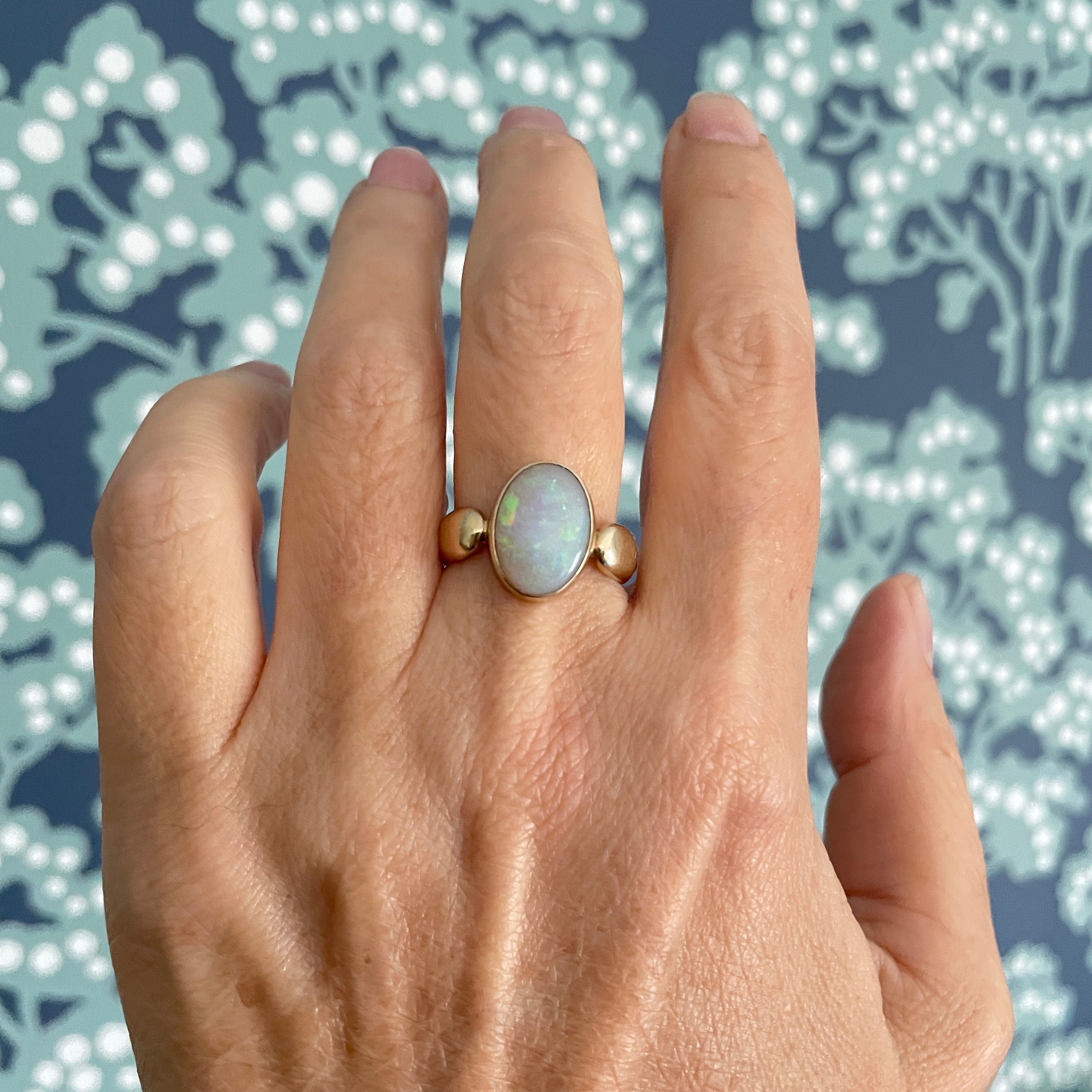 Modern art deco style opal 9ct gold ring